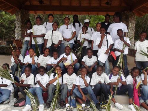 Students with their Thatch Brooms